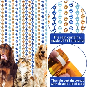 Blue and gold paw print rain curtain backdrop for pet birthday party decorations