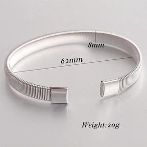 Close-up of 6mm stainless steel wire bangle with 8mm width and 62mm diameter details