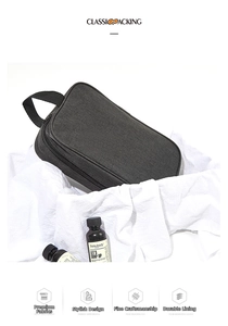 Close-up of waterproof Oxford fabric and dual zipper detail on a grey travel bag