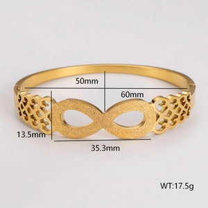 Gold infinity knot stainless steel bangle with hollow celtic pattern and size details