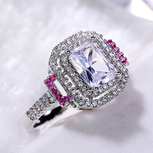 Luxurious princess cut square ring with pink accents and crystal pavé setting