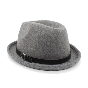 Detail of grey wool felt fedora featuring a black leather band and silver metal buckle