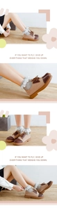 Detail of light gray socks with white lace trim paired with brown lace-up oxford shoes