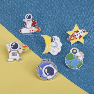 Collection of six space-themed enamel pins featuring astronauts, rockets and planets