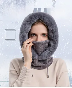 Close-up of the thick faux fur lining and knit texture of the grey winter balaclava