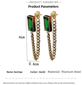 Detail view of gold titanium steel earrings with green gems and 4cm length measurements