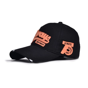 Close-up of distressed brim and 3D orange embroidery on black vintage baseball cap