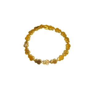 Polished gold gourd wulu link bracelet with sparkling pavé crystal center focal point