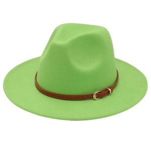 Detail of green fedora hat featuring a brown faux leather belt with golden buckle