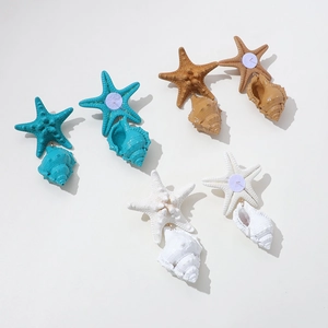 Tropical starfish and conch seashell drop earrings in blue, brown and white colors