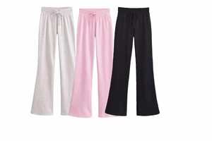 Detail of drawstring waist on cotton blend flare trousers in grey, pink, and black