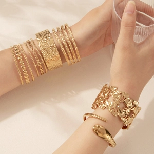 Adjustable golden stainless steel bracelets with hammered texture and butterfly design
