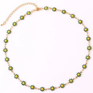 Detail of 18K gold necklace featuring green daisy flower petals with a secure lobster clasp