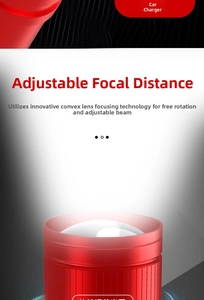 Detail of red metal mini LED flashlight showing zoomable convex lens and car charging plug
