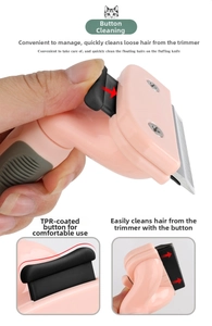 Pink pet grooming brush detail showing the easy one-click hair cleaning button feature