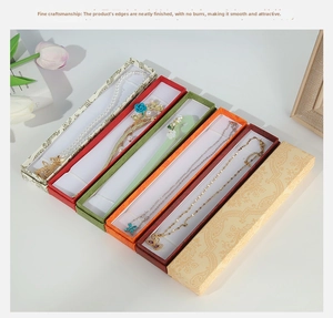 Various colorful rectangular jewelry gift boxes for necklaces and vintage ornaments