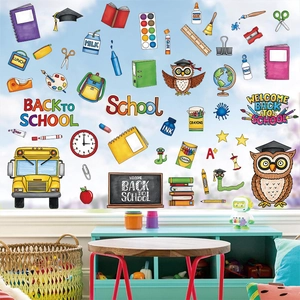 Vibrant back to school stickers set with school bus and owl designs on window glass