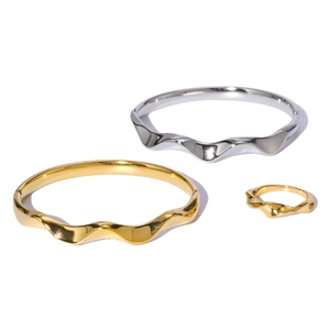 Minimalist wave-pattern stainless steel jewelry set with gold and silver bangles