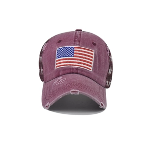 Close-up of distressed cotton baseball cap with American flag patch and star details