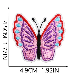 Detailed view of colorful butterfly embroidery patch with precise size measurements