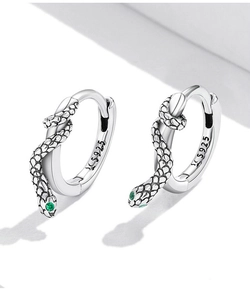 Detail of S925 sterling silver snake hoop earring with green gemstone eyes and scales