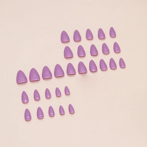 Solid light purple almond-shaped press-on nails with a glossy finish, set of 24 pieces