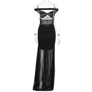 Detail of sexy black off-shoulder maxi dress with transparent mesh panels and split hem