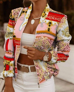 Detailed view of women cardigan jacket with baroque chain and leopard print in pink