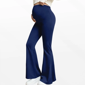 Detail showing the supportive high-waist band and flared leg cut on maternity yoga pants
