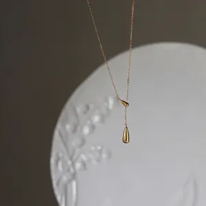 Minimalist 18K gold plated titanium steel necklace with a polished water drop pendant