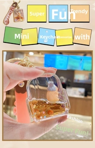 Detailed macro view of liquid quicksand bubble tea bag charm with cute animal figure