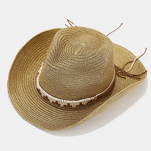 Golden straw western cowboy sun hat with decorative white rope and wide brim for women
