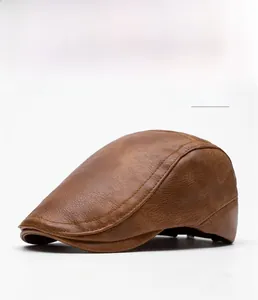 Detail of khaki PU leather beret showing premium texture and fine stitching work
