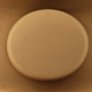Macro detail of high-density fine felt texture on a French style flat top wide brim hat