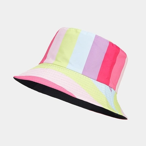 Close-up of rainbow striped bucket hat with a wide brim and soft black cotton lining