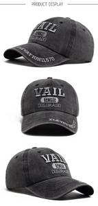 Detailed views of washed cotton baseball cap with VAIL Colorado embroidery and side stitching