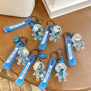 Astronaut liquid quicksand keychain with transparent space bottle and blue strap