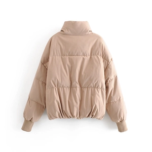 Back view of apricot quilted puffer jacket featuring high collar and ribbed cuffs