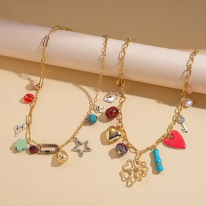 Two-piece gold chain necklace with colorful resin heart, flower and key pendants