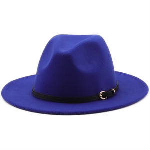 Detail of royal blue wool fedora featuring a black leather band and golden metal buckle