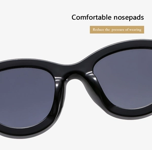 Dettaglio dei naselli confortevoli su occhiali da sole ovali vintage per il comfort