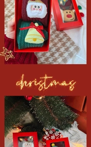 Christmas gift box containing coral fleece baby socks with festive embroidery patterns