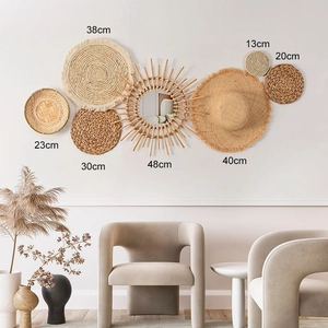 Detailed arrangement of 7 woven wall baskets and mirror for boho home decor