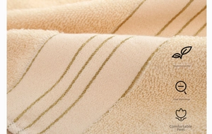 Detail of soft beige cotton towel showing high color fastness and low shrinkage texture