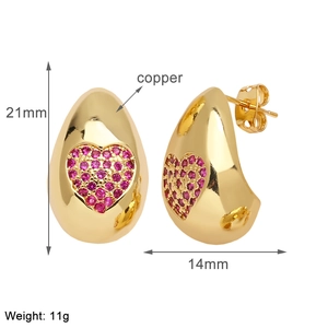 Detail of gold water drop earrings with red heart zircon, 21mm height and copper material