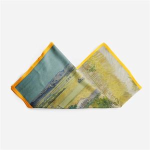 Detailed close-up of silk scarf featuring Van Gogh Wheat Field with Cypresses oil painting