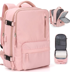 Mochila de viaje rosa con puerto de carga USB y múltiples compartimentos útiles