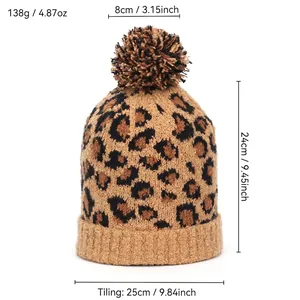 Leopard print knit beanie for women with large pompom and winter windproof cuff