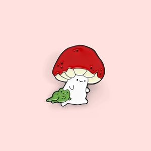 Cute cartoon red mushroom and green frog enamel pin accessory for backpacks and jackets