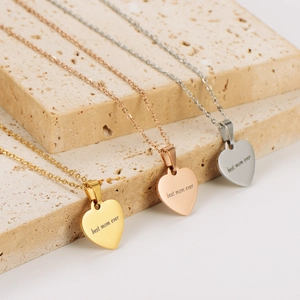 Polished 18k gold heart necklaces in three colors with Best Mom Ever engraving
